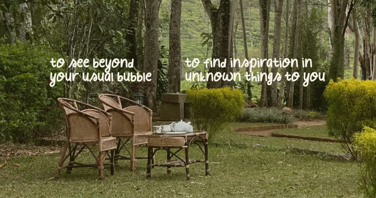 In the green garden, there's a table with the afternoon tea and two chairs.